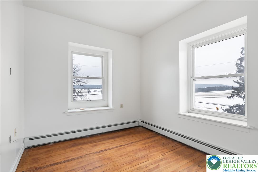 384 Evansville Road Fleetwood, PA 19522 - Photo 22 of 54 an empty room with a window
