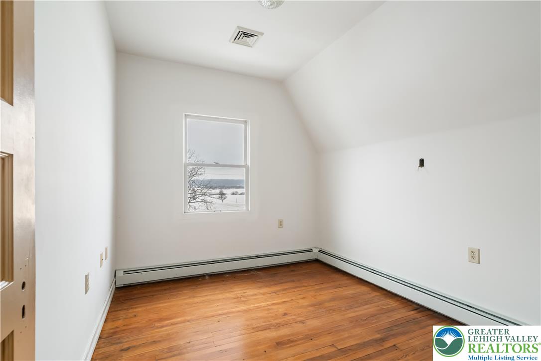 384 Evansville Road Fleetwood, PA 19522 - Photo 36 of 54 an empty room with a window