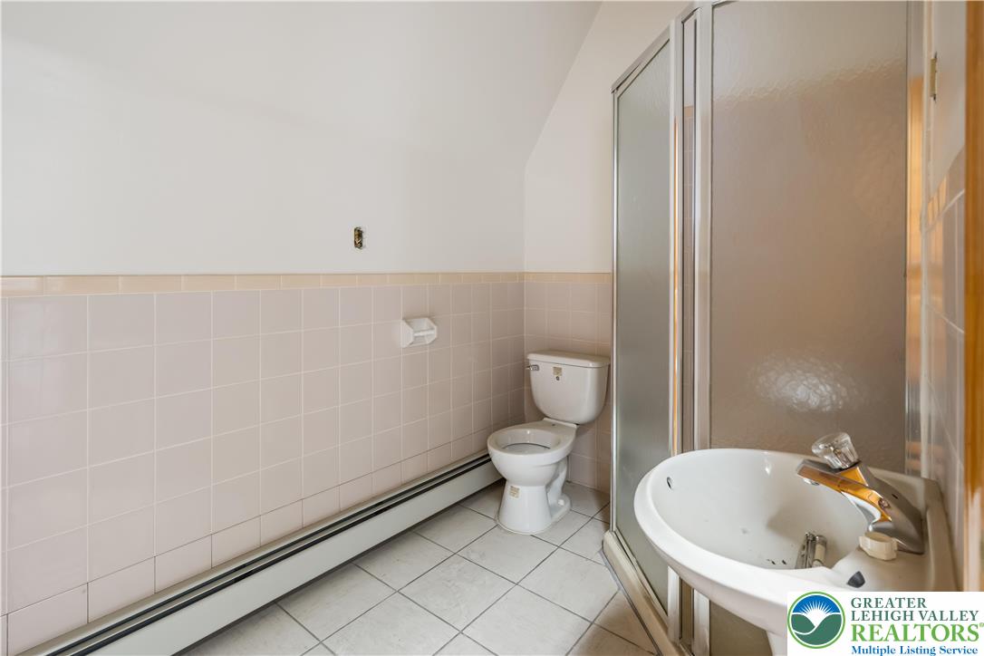 384 Evansville Road Fleetwood, PA 19522 - Photo 44 of 54 a bathroom with a sink and a toilet
