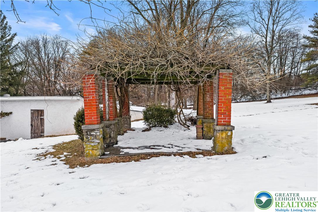 384 Evansville Road Fleetwood, PA 19522 - Photo 45 of 54 a view of a outdoor space covered with snow in the background