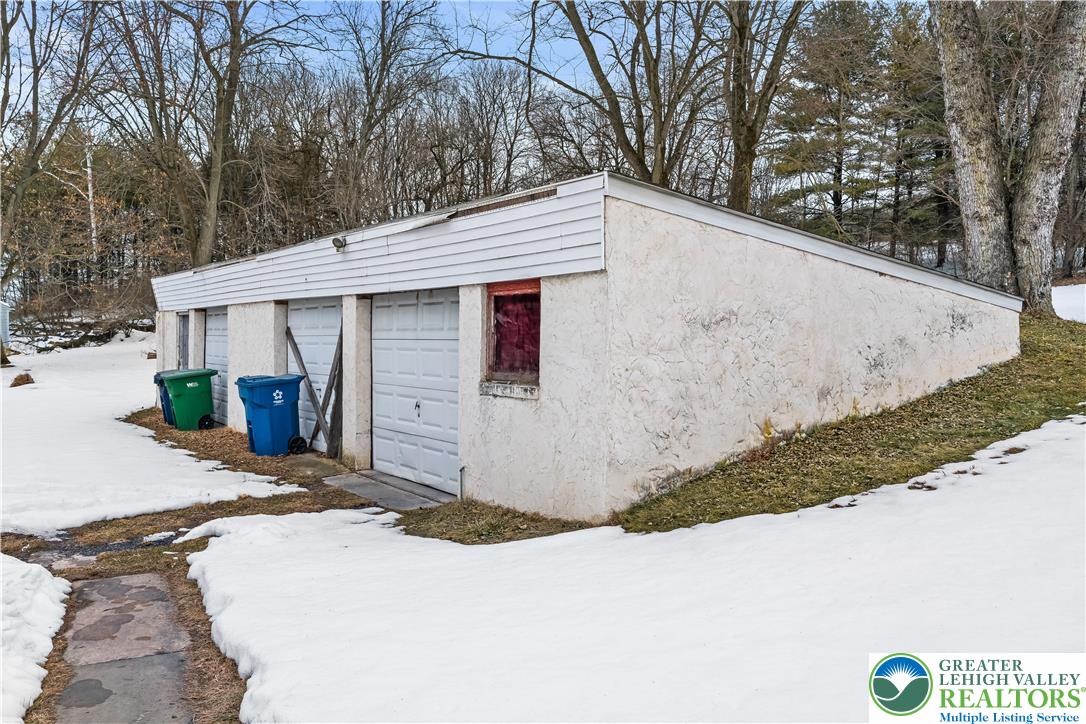 384 Evansville Road Fleetwood, PA 19522 - Photo 47 of 54 a view of a house with a yard covered in snow