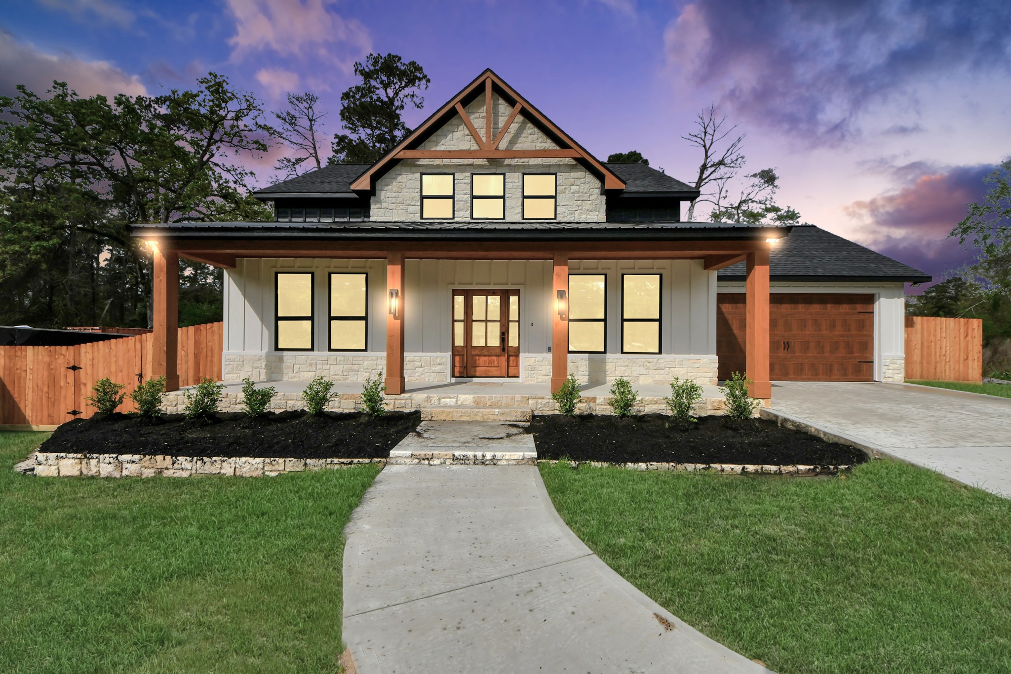 29727 Spring Forest Drive Spring, TX 77386 - Photo 1 of 37 a front view of a house with a garden