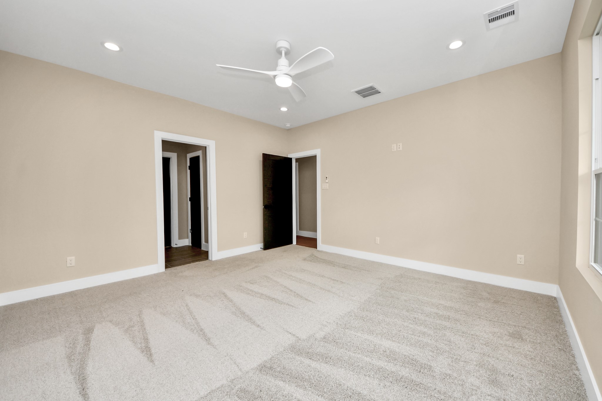 29727 Spring Forest Drive Spring, TX 77386 - Photo 18 of 37 a view of an empty room with a ceiling fan