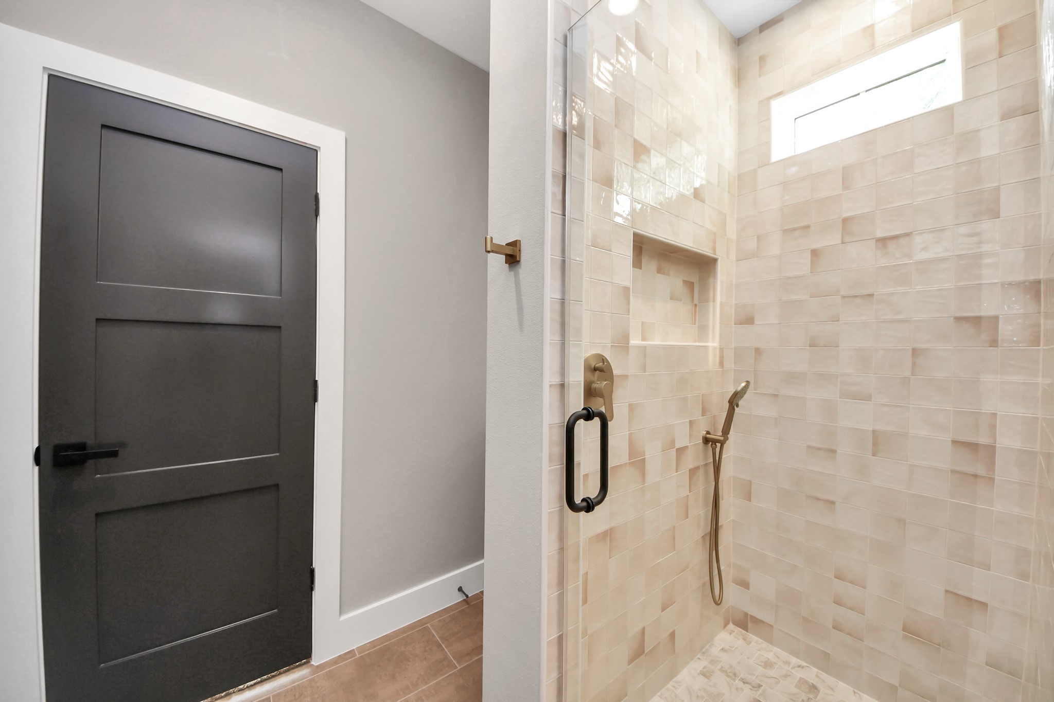 29727 Spring Forest Drive Spring, TX 77386 - Photo 22 of 37 a bathroom with a glass shower door