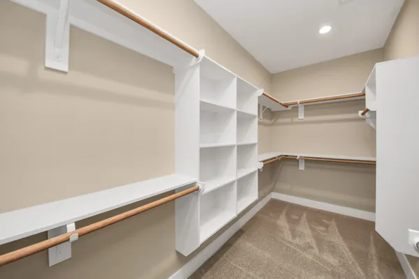 a view of an empty walk in closet