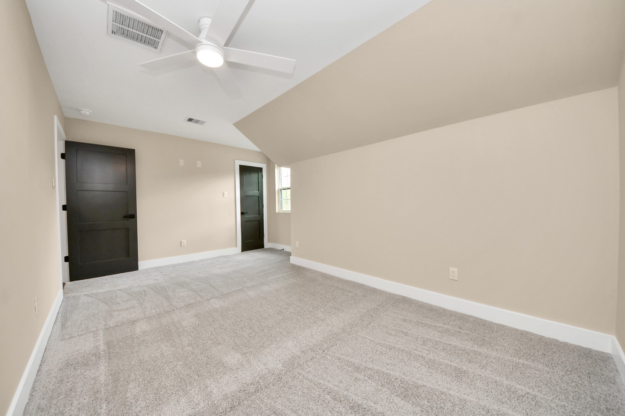 29727 Spring Forest Drive Spring, TX 77386 - Photo 31 of 37 an empty room with a ceiling fan and a ceiling fan