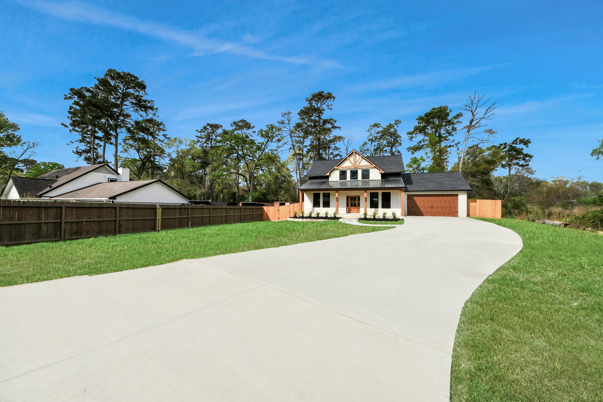 29727 Spring Forest Drive Spring, TX 77386 - Photo 5 of 37 a front view of a house with a yard