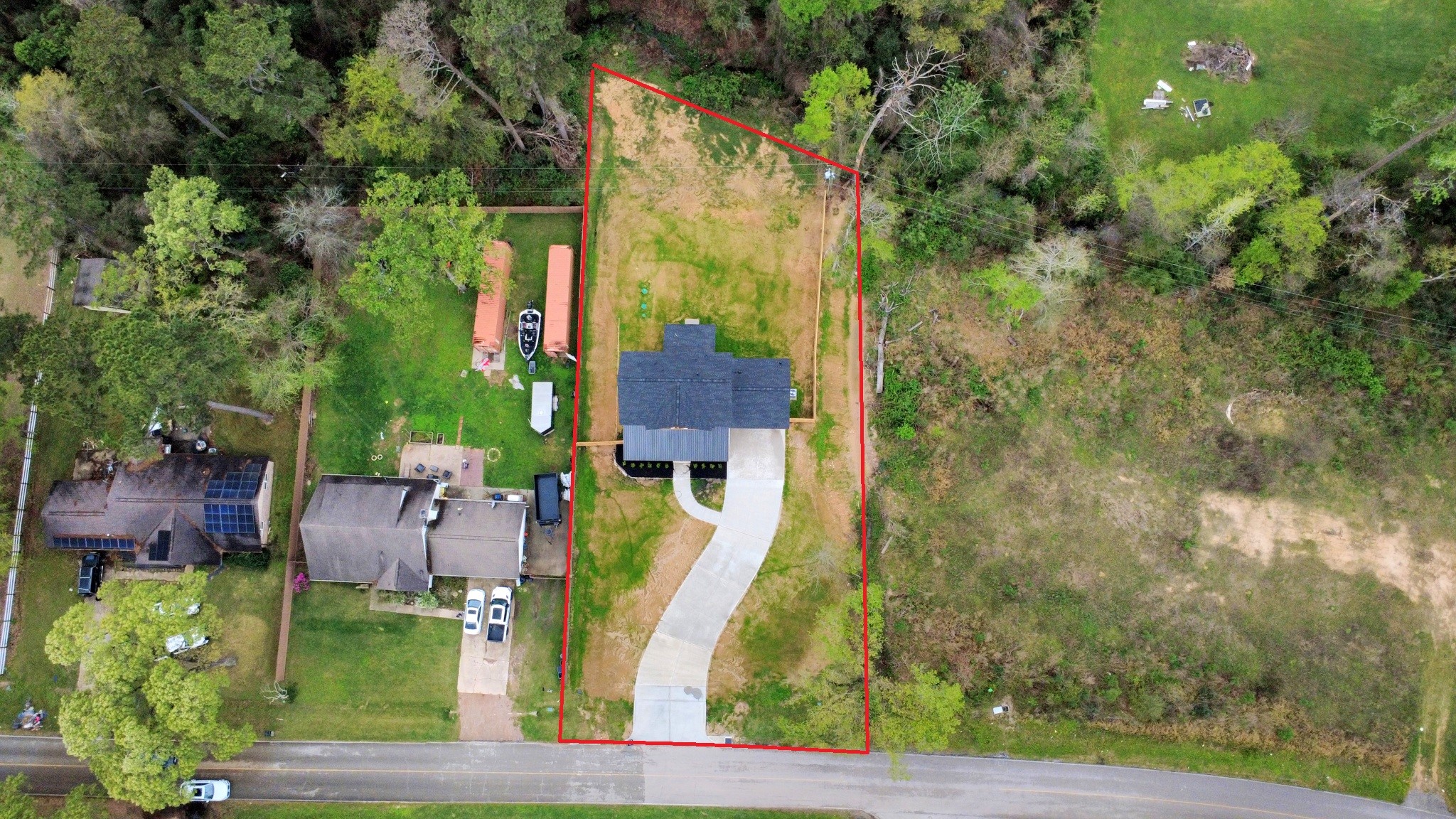 29727 Spring Forest Drive Spring, TX 77386 - Photo 7 of 37 an aerial view of residential houses with outdoor space and trees