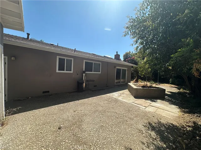 a house view with a outdoor space