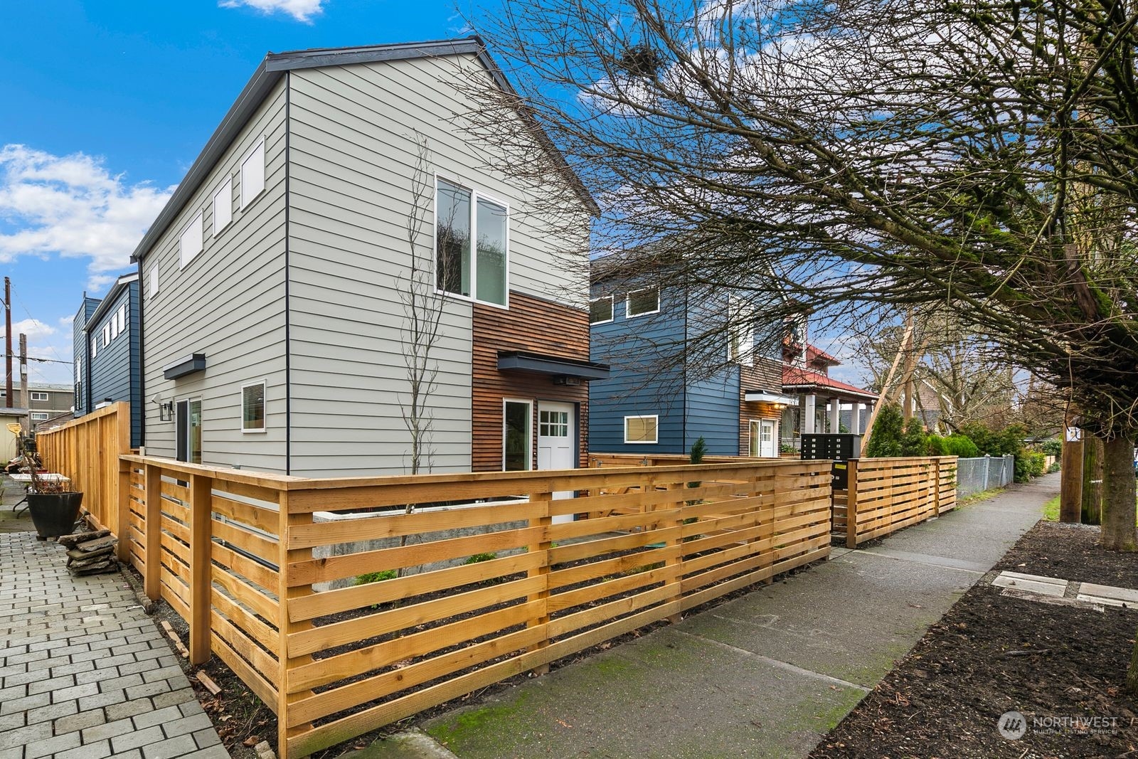 1006 B South Donovan Street Seattle, WA 98108 - Photo 1 of 14 a front view of a house with a yard
