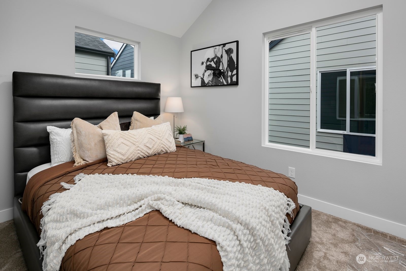 1006 B South Donovan Street Seattle, WA 98108 - Photo 11 of 14 a bedroom with a bed and a window
