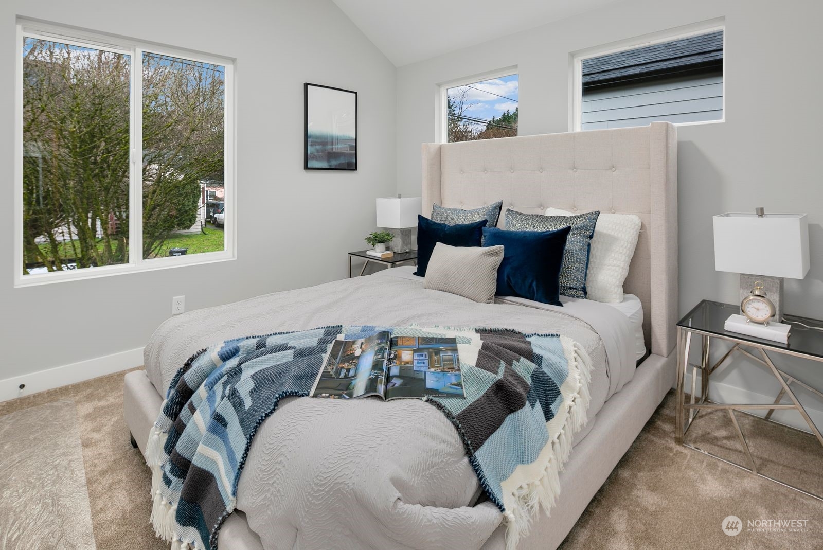 1006 B South Donovan Street Seattle, WA 98108 - Photo 13 of 14 a bed sitting in a bedroom next to a window
