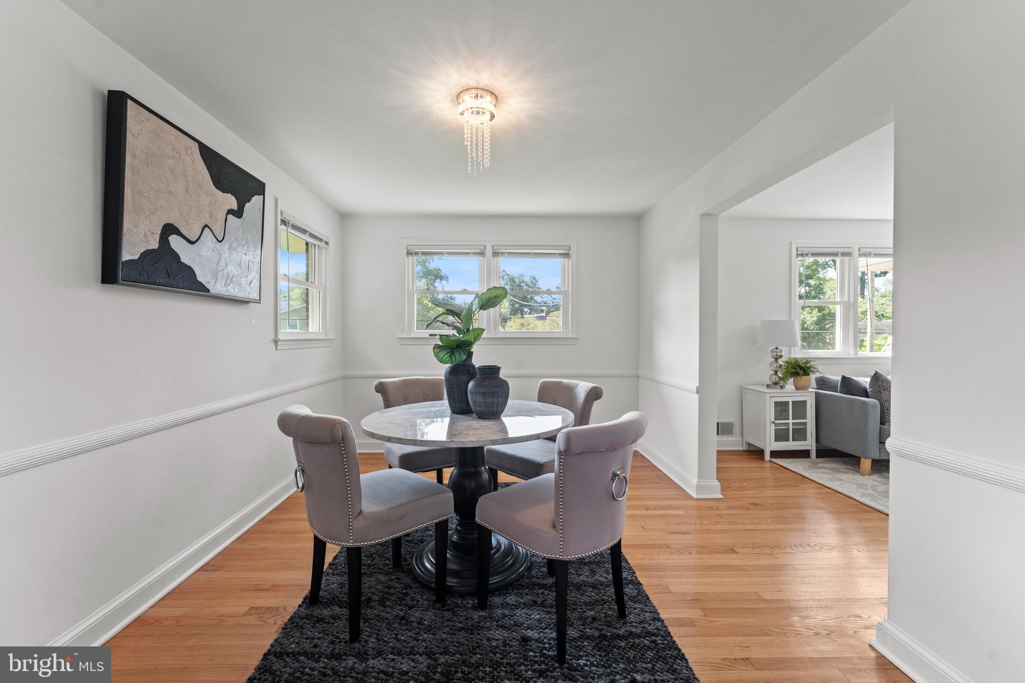 11006 Childs Street Silver Spring, MD 20901 - Photo 11 of 71 a view of a dining room with furniture and a livingroom