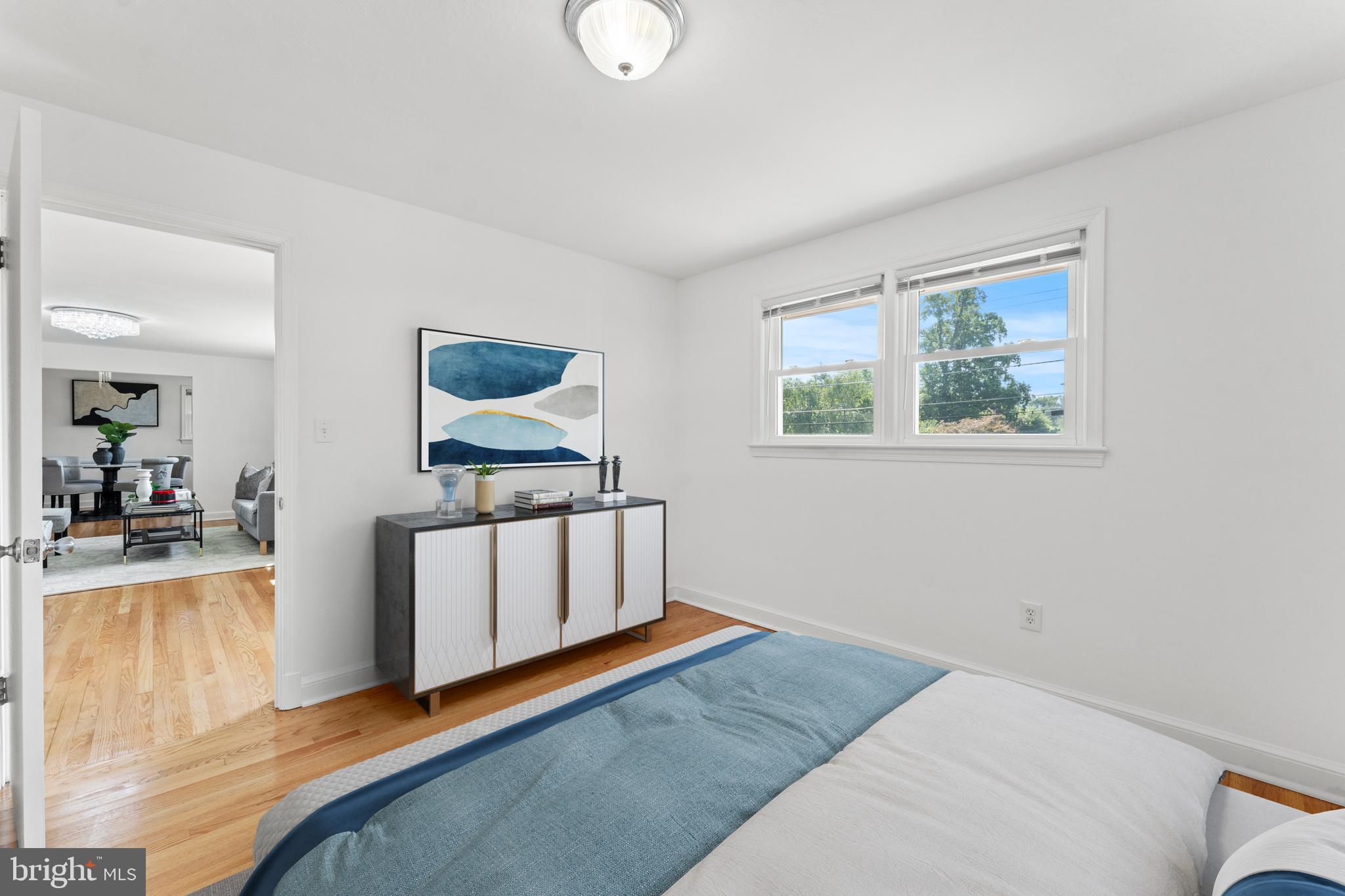 11006 Childs Street Silver Spring, MD 20901 - Photo 18 of 71 a living room with furniture and a flat screen tv