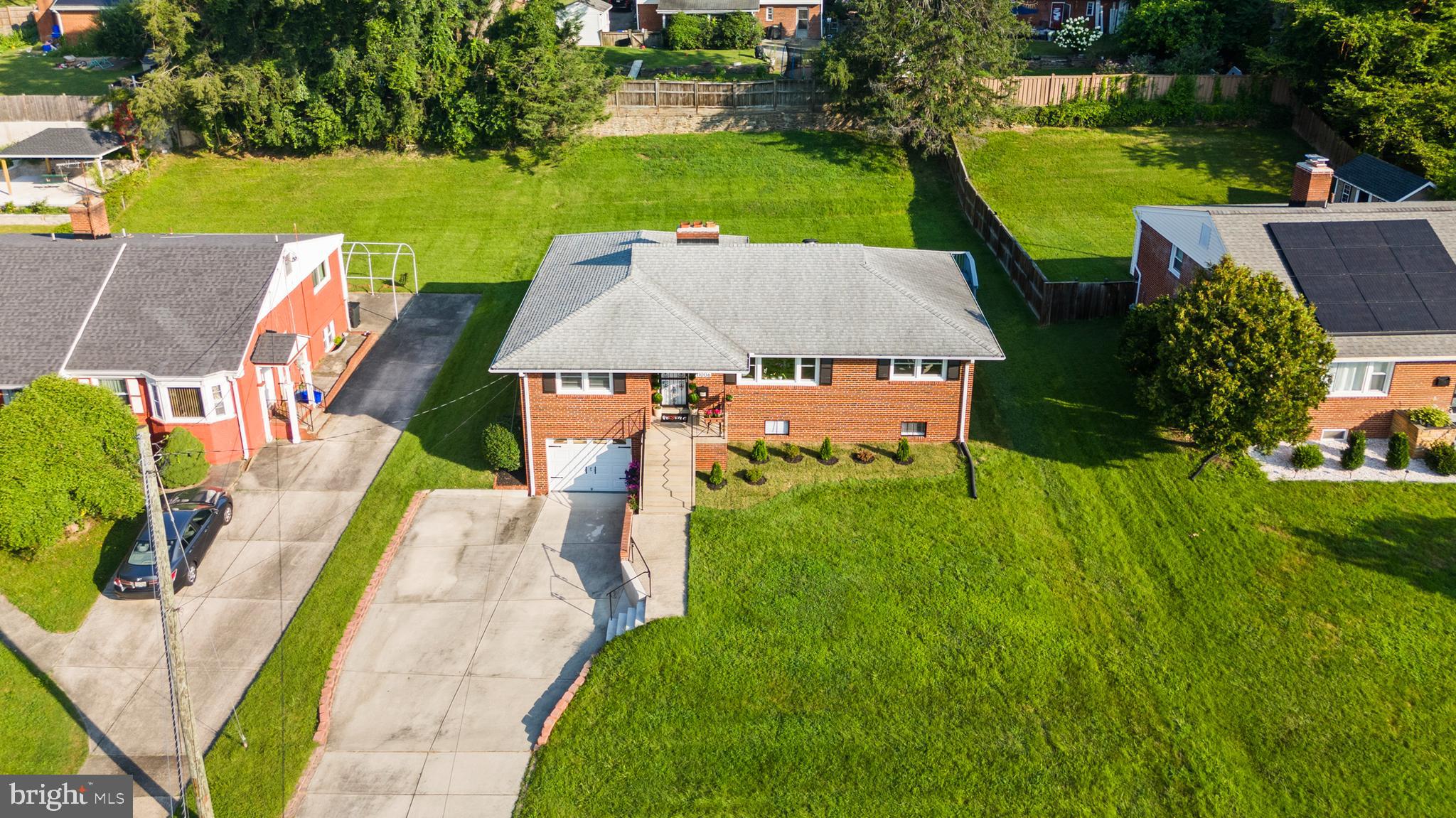 11006 Childs Street Silver Spring, MD 20901 - Photo 2 of 71 an aerial view of a house with swimming pool garden and patio