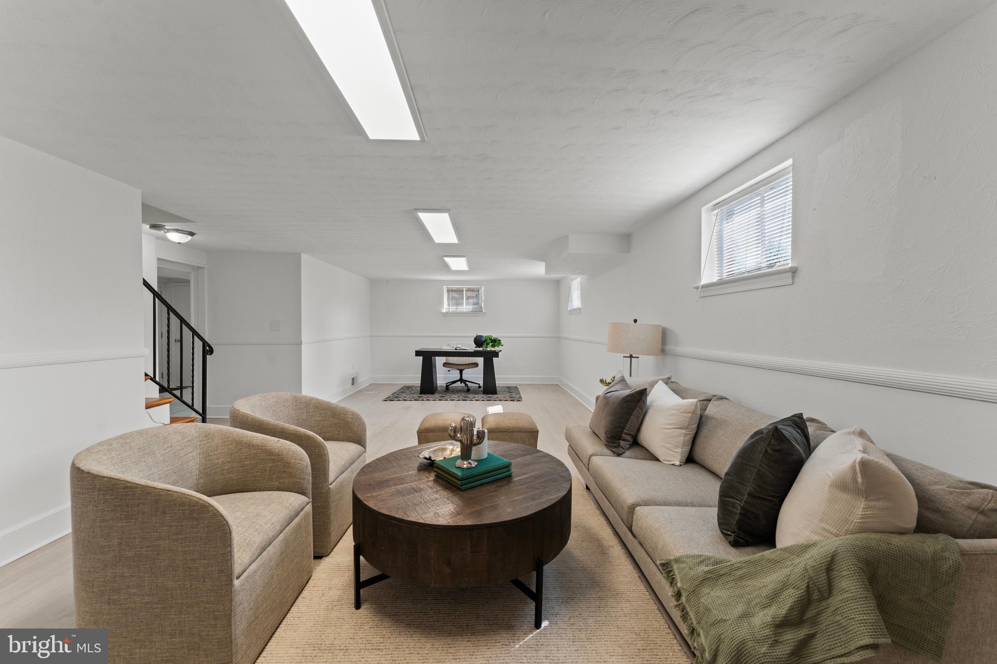 11006 Childs Street Silver Spring, MD 20901 - Photo 37 of 71 a living room with furniture and a couch