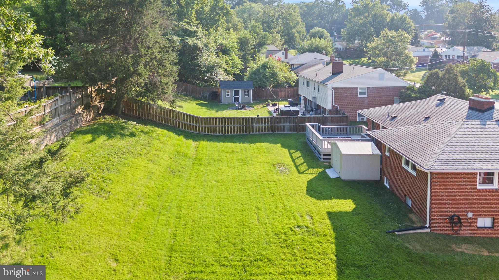 11006 Childs Street Silver Spring, MD 20901 - Photo 52 of 71 an aerial view of a house with swimming pool and large trees