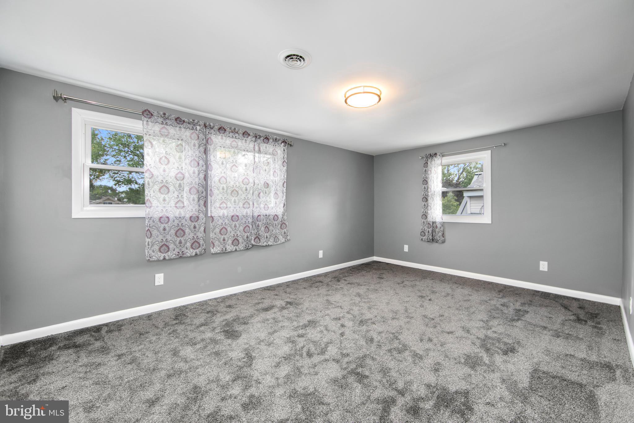 325 Landis Avenue Oaklyn, NJ 08107 - Photo 22 of 46 a view of an empty room with a window