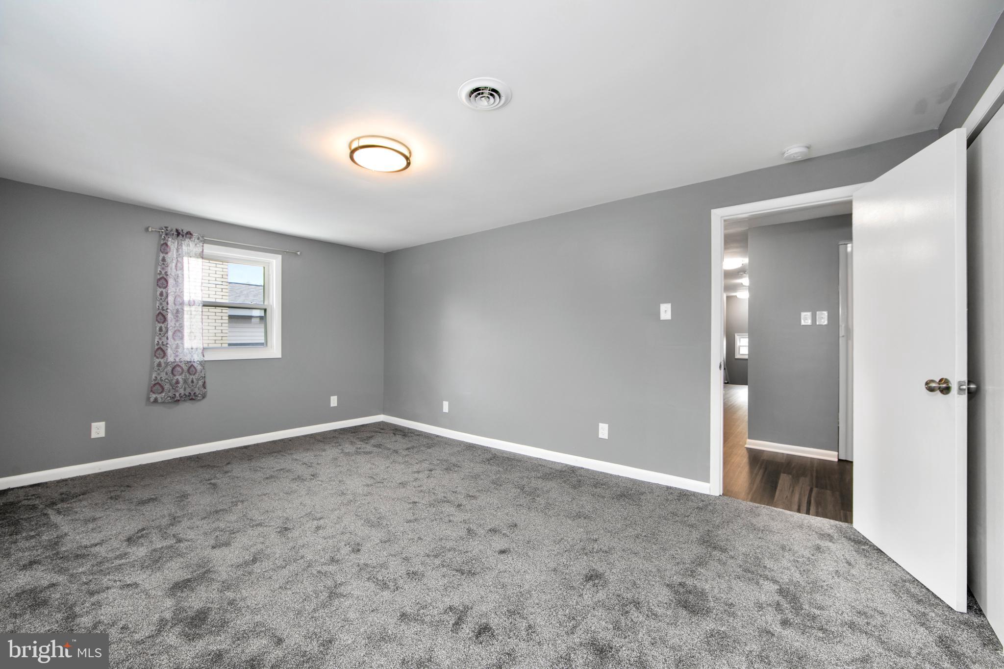 325 Landis Avenue Oaklyn, NJ 08107 - Photo 23 of 46 a view of an empty room with a window