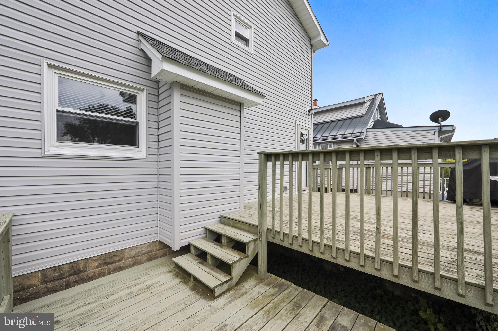 325 Landis Avenue Oaklyn, NJ 08107 - Photo 40 of 46 a view of a white house with a roof deck