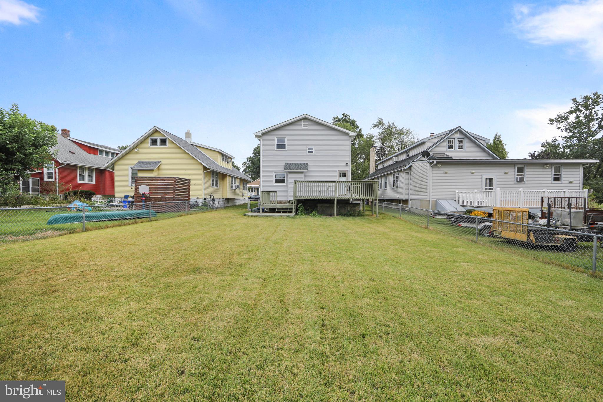 325 Landis Avenue Oaklyn, NJ 08107 - Photo 44 of 46 a view of a house with a big yard and large trees