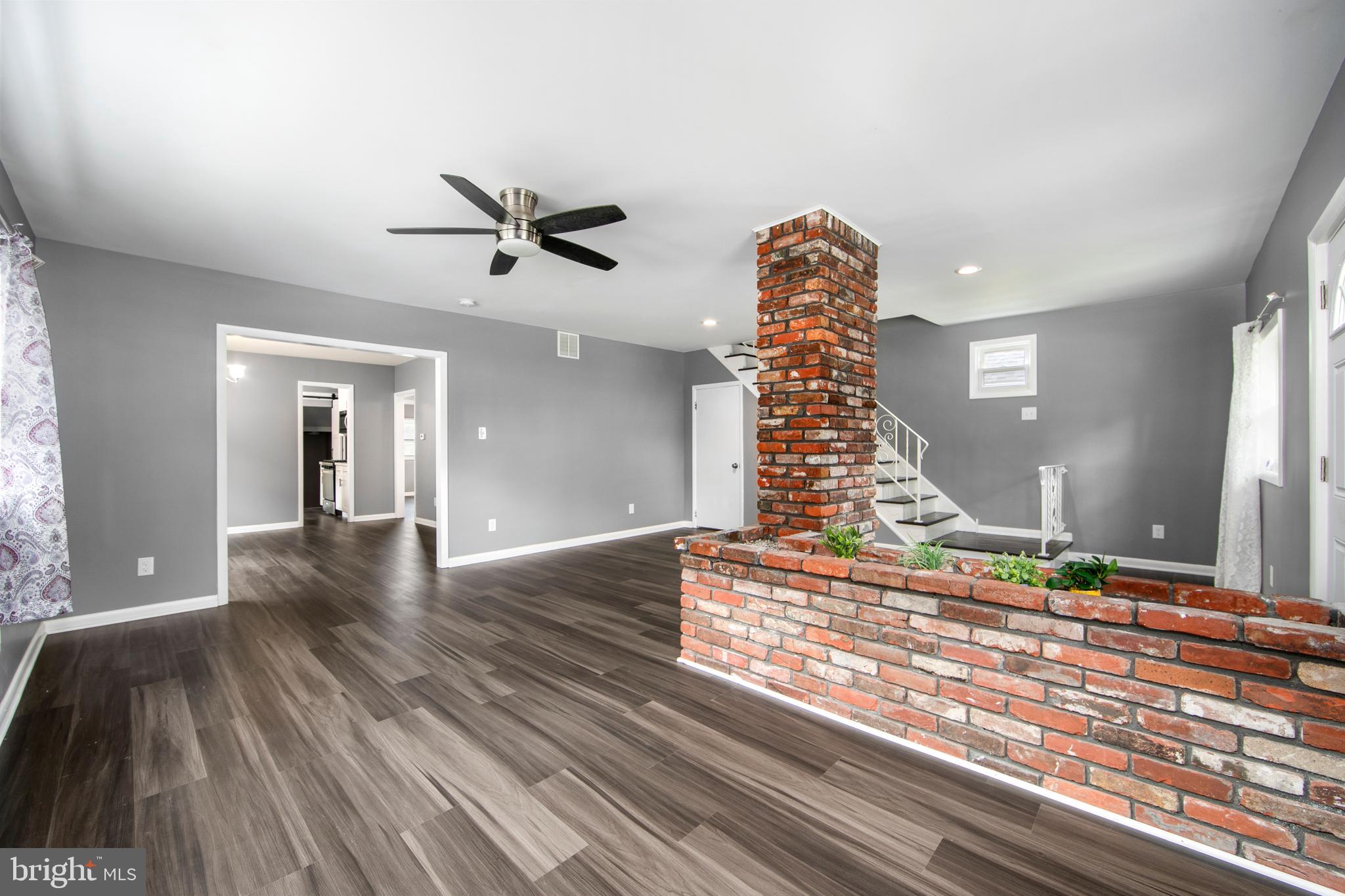 325 Landis Avenue Oaklyn, NJ 08107 - Photo 8 of 46 a view of entryway and hall with wooden floor