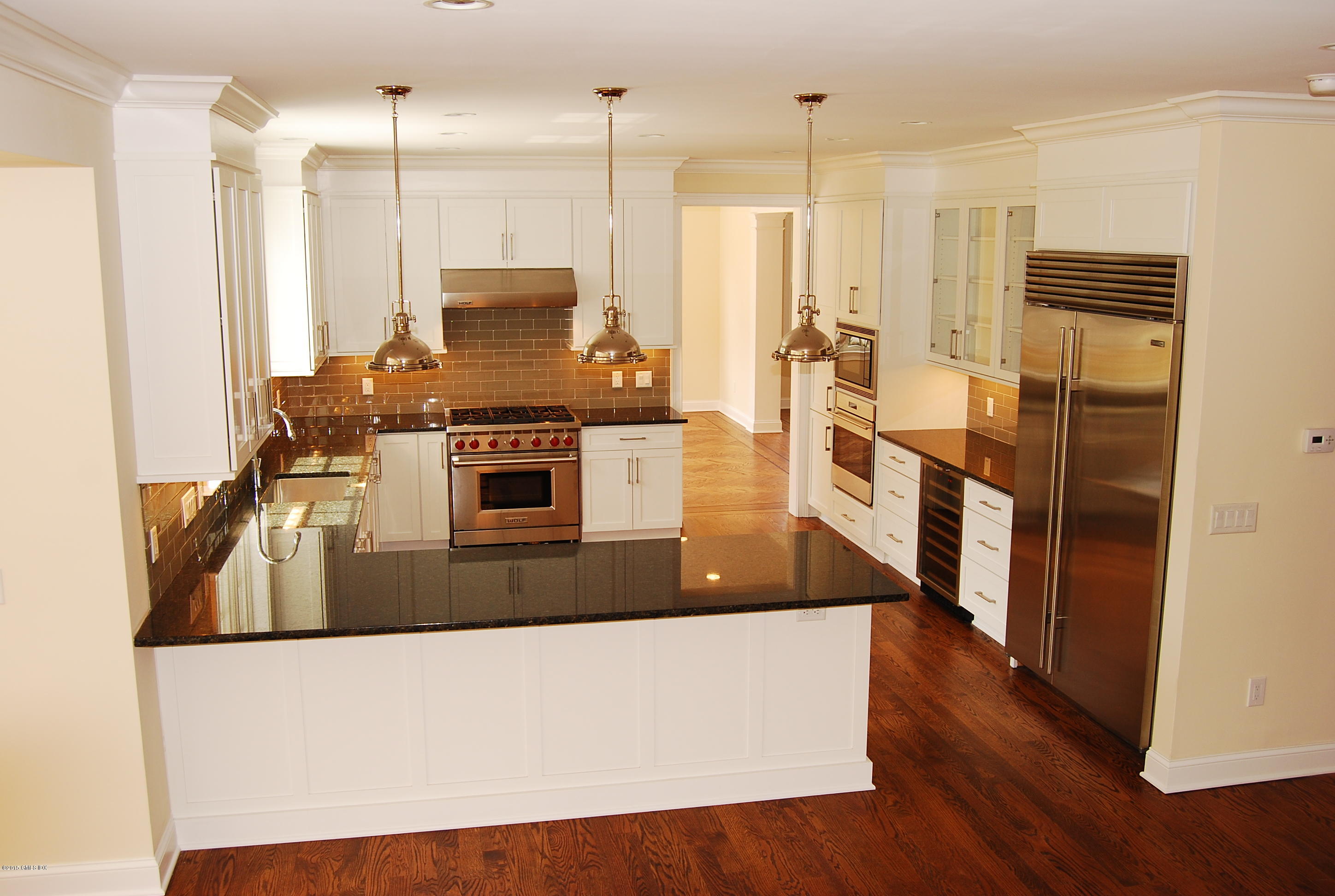 272 Palmer Hill Road Riverside, CT 06878 - Photo 8 of 25 a large kitchen with stainless steel appliances granite countertop a stove a sink and a refrigerator