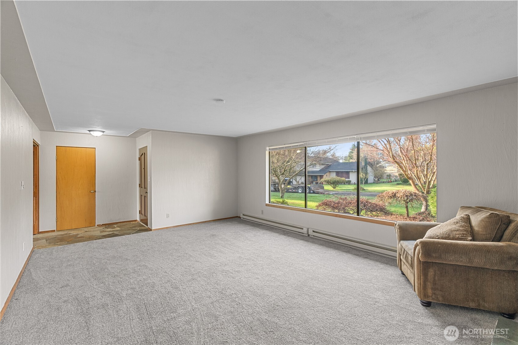 214 Talbot Street North Montesano, WA 98563 - Photo 4 of 40 a view of an empty room with a window