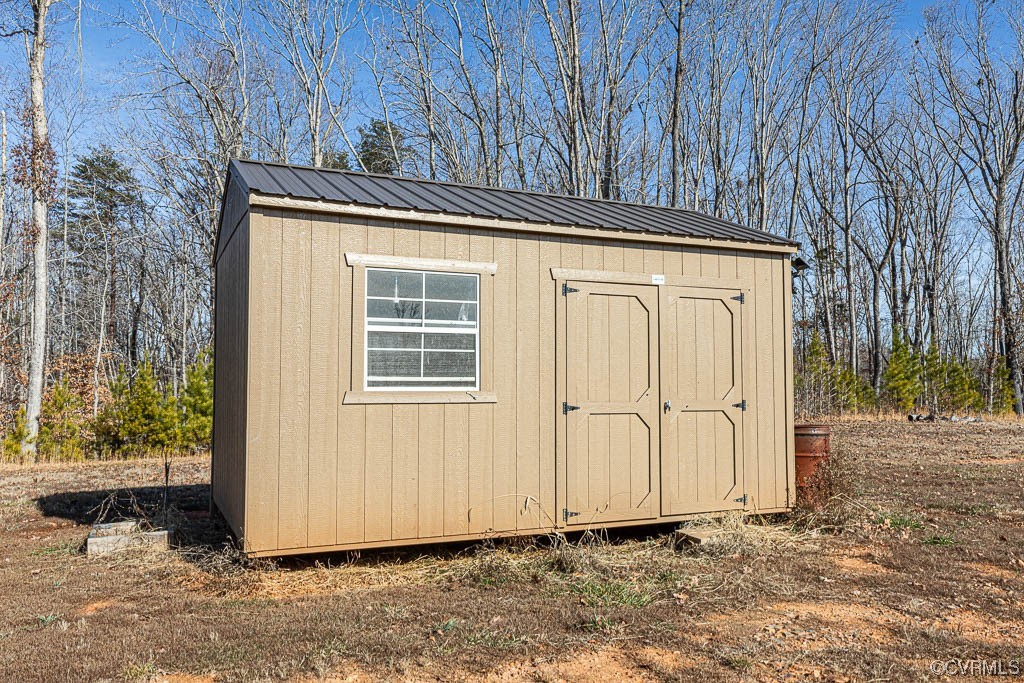 0 The Falls Road Crewe, VA 23930 - Photo 21 of 24 a view of a house with backyard