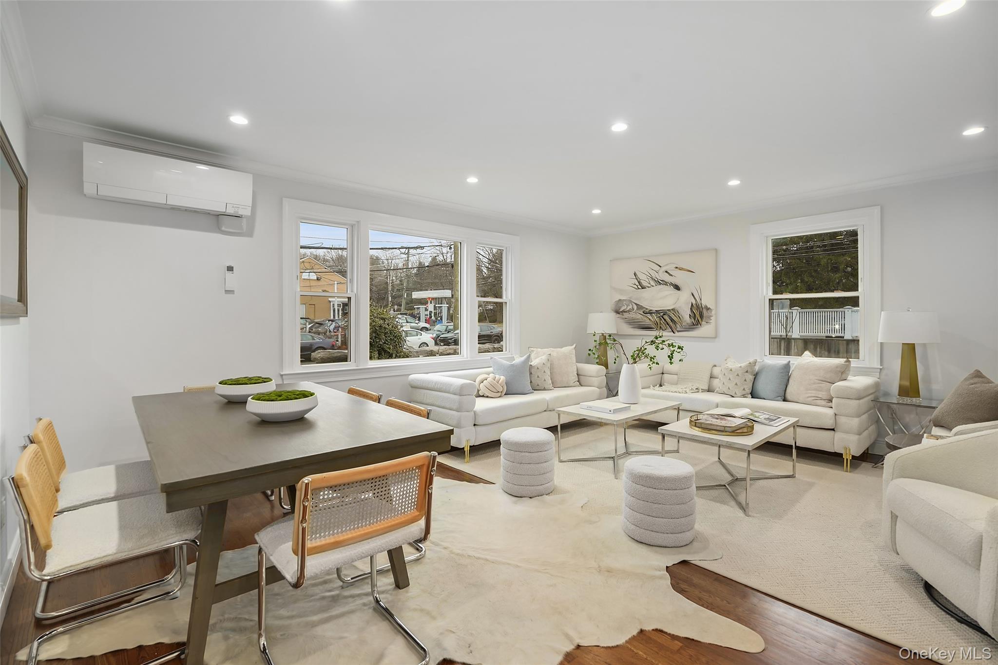 11 Orchard Avenue, Unit 3 Rye, NY 10580 - Photo 2 of 11 a living room with lots of white furniture and a table