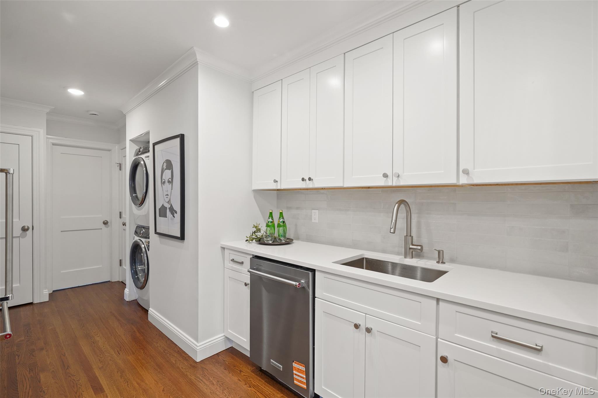 11 Orchard Avenue, Unit 3 Rye, NY 10580 - Photo 3 of 11 a kitchen with a sink and a refrigerator