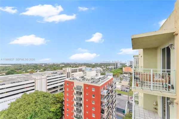 a view of a balcony with city view