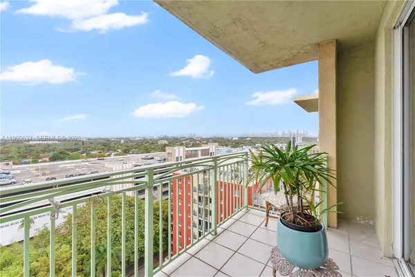 a view of balcony with furniture