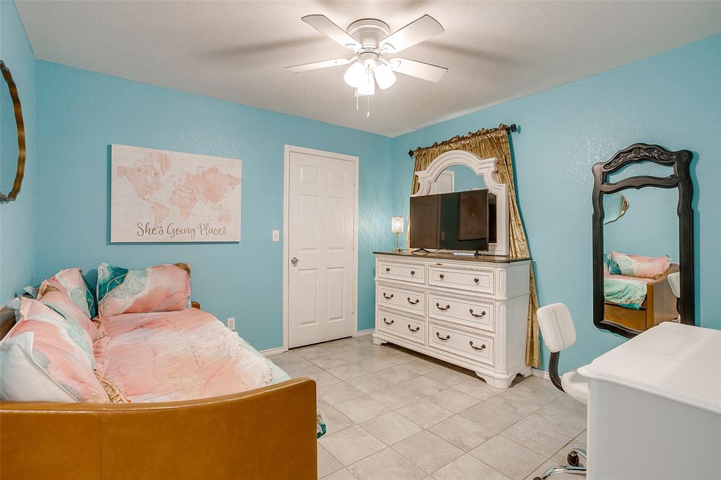 408 South Cleburne Whitney Road Rio Vista, TX 76093 - Photo 12 of 16 a living room with furniture and a flat screen tv