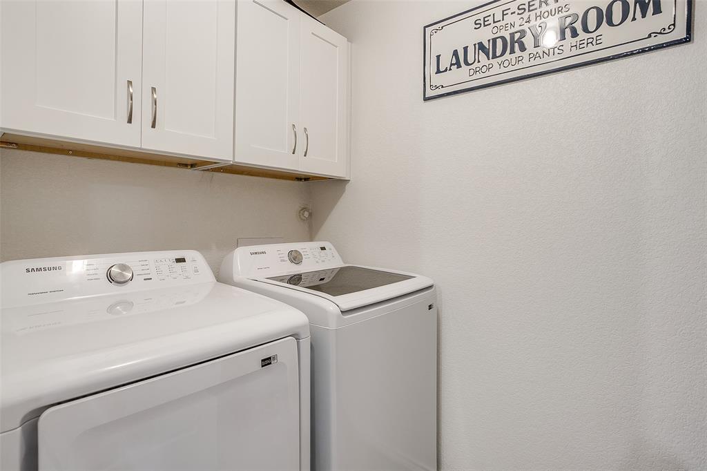 408 South Cleburne Whitney Road Rio Vista, TX 76093 - Photo 16 of 16 a utility room with dryer and washer