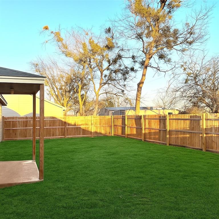 408 South Cleburne Whitney Road Rio Vista, TX 76093 - Photo 2 of 16 a view of yard with tree s