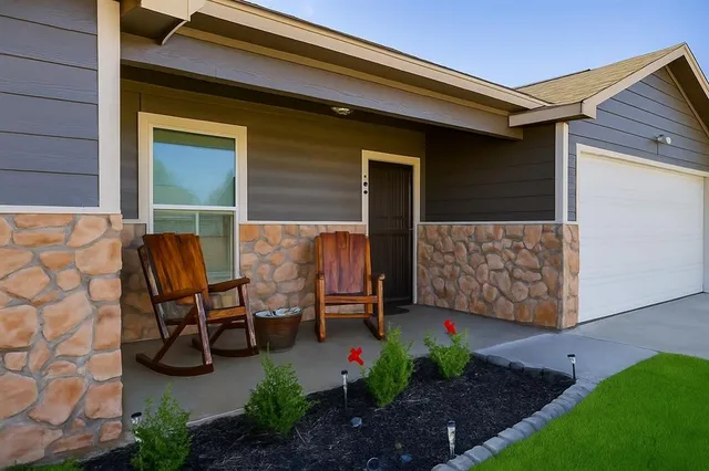 a garden view with a seating space