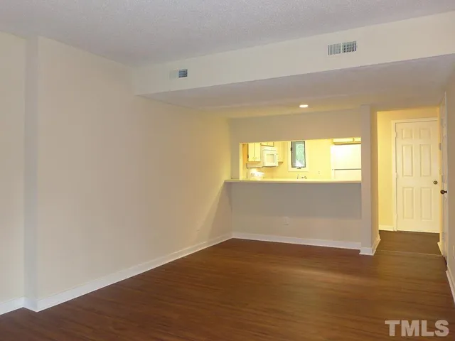 a view of an empty room and window