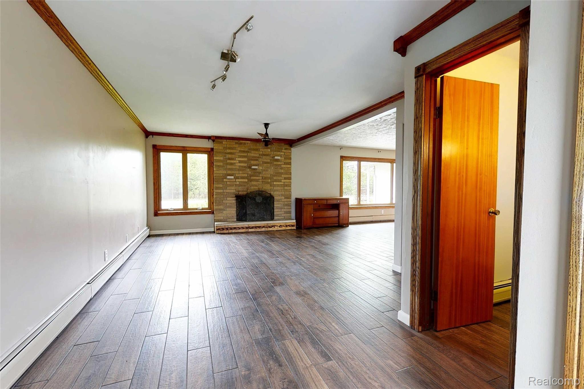1296 West Parks Road St. Johns, MI 48879 - Photo 11 of 30 1238-W-Parks-Rd-3 Living Room.jpg
