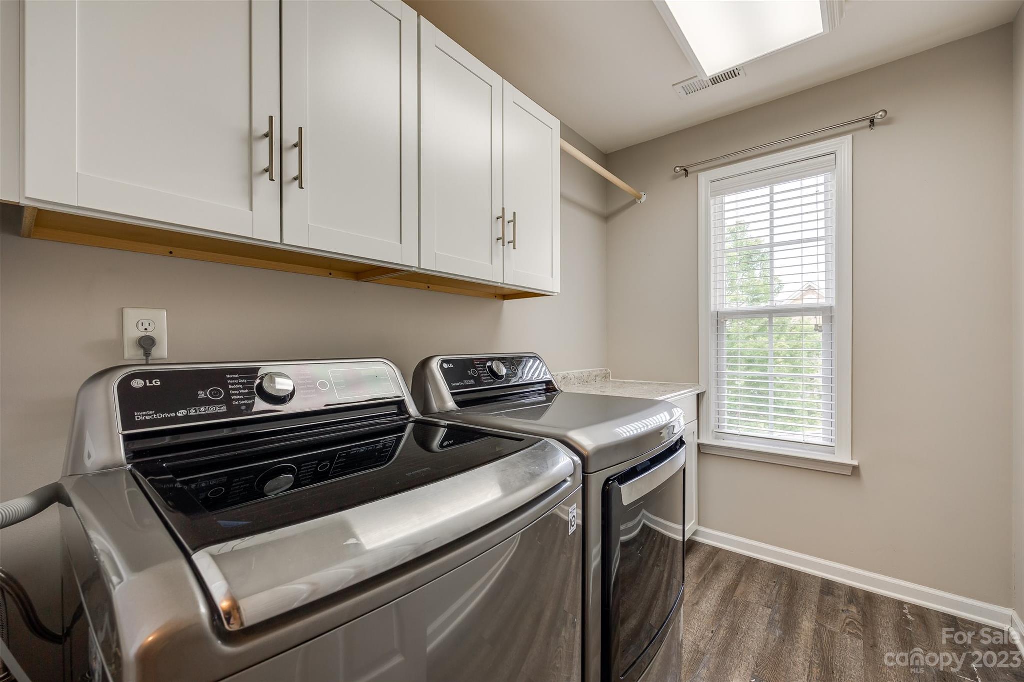 1055 Silver Gull Drive Tega Cay, SC 29708 - Photo 27 of 35 a utility room with dryer and washer