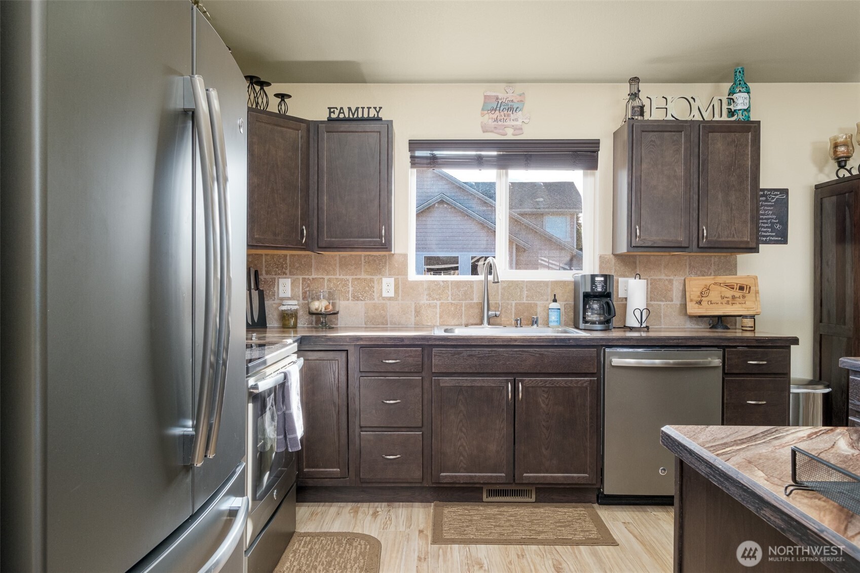 52 Linda Ridge Loop Ephrata, WA 98823 - Photo 11 of 40 a kitchen with a sink appliances and cabinets