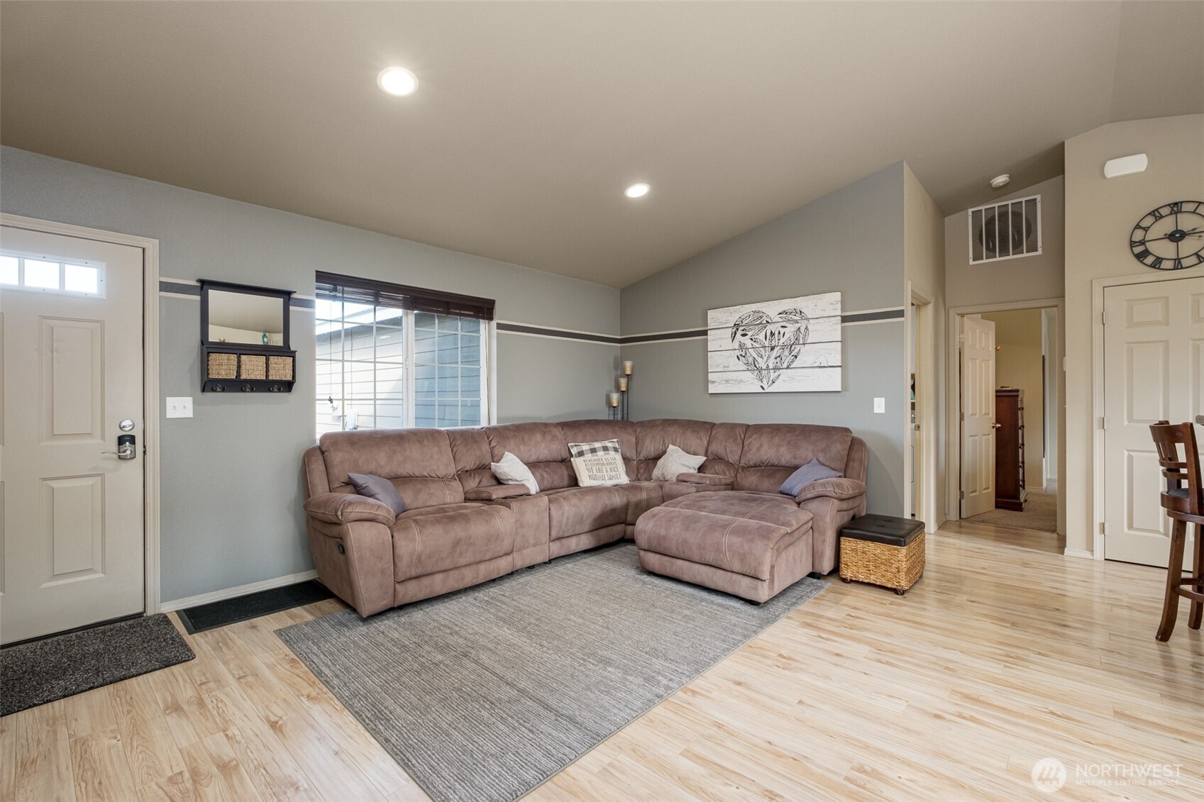 52 Linda Ridge Loop Ephrata, WA 98823 - Photo 13 of 40 a large living room with a couch and a wooden floor