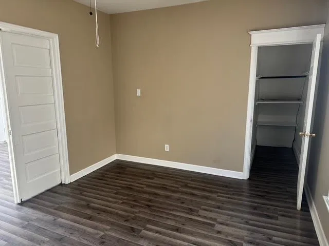 a view of an empty walk in closet