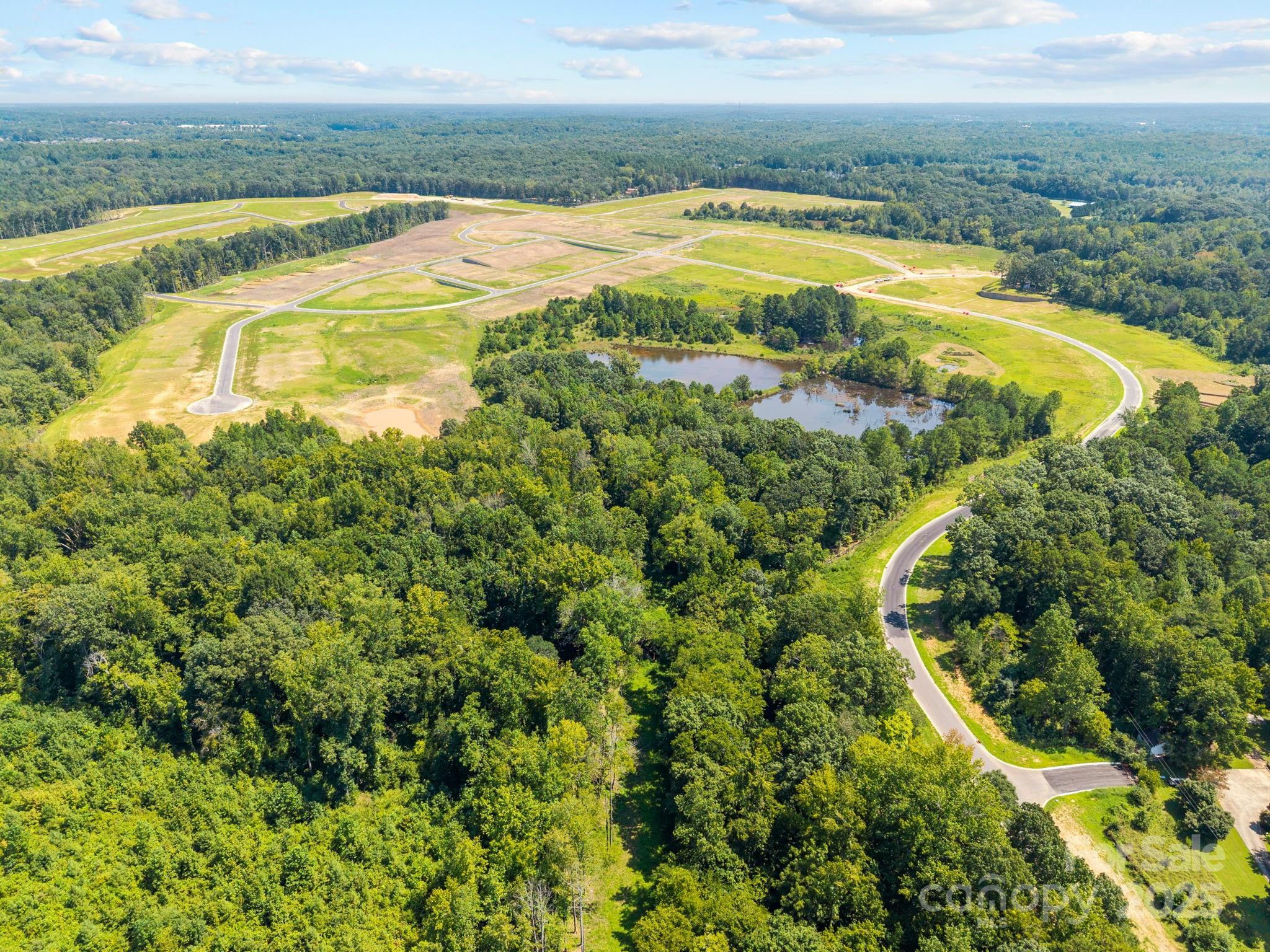 8200 Henry Harris Road, Unit 1 Fort Mill, SC 29707 - Photo 21 of 25 a view of a swimming pool with an outdoor space and seating area