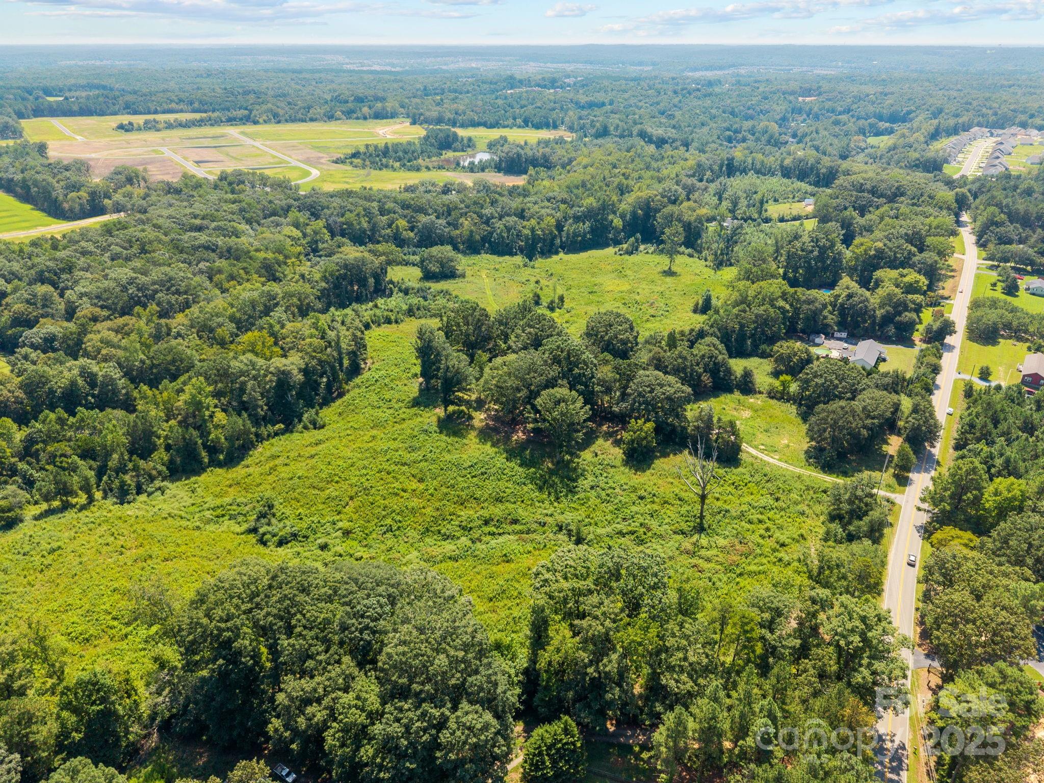 8200 Henry Harris Road, Unit 1 Fort Mill, SC 29707 - Photo 7 of 25 a view of a lake with a city