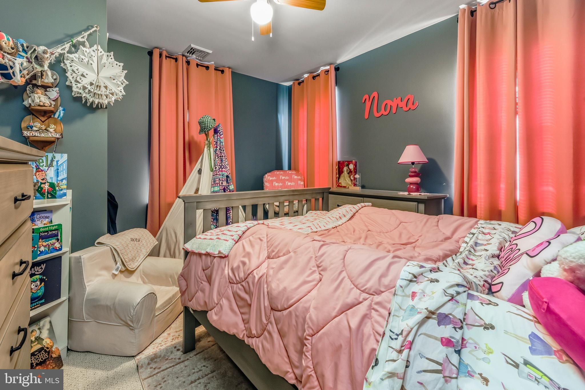 18 Front Street Glendora, NJ 08029 - Photo 17 of 21 a bedroom with a bed and a window