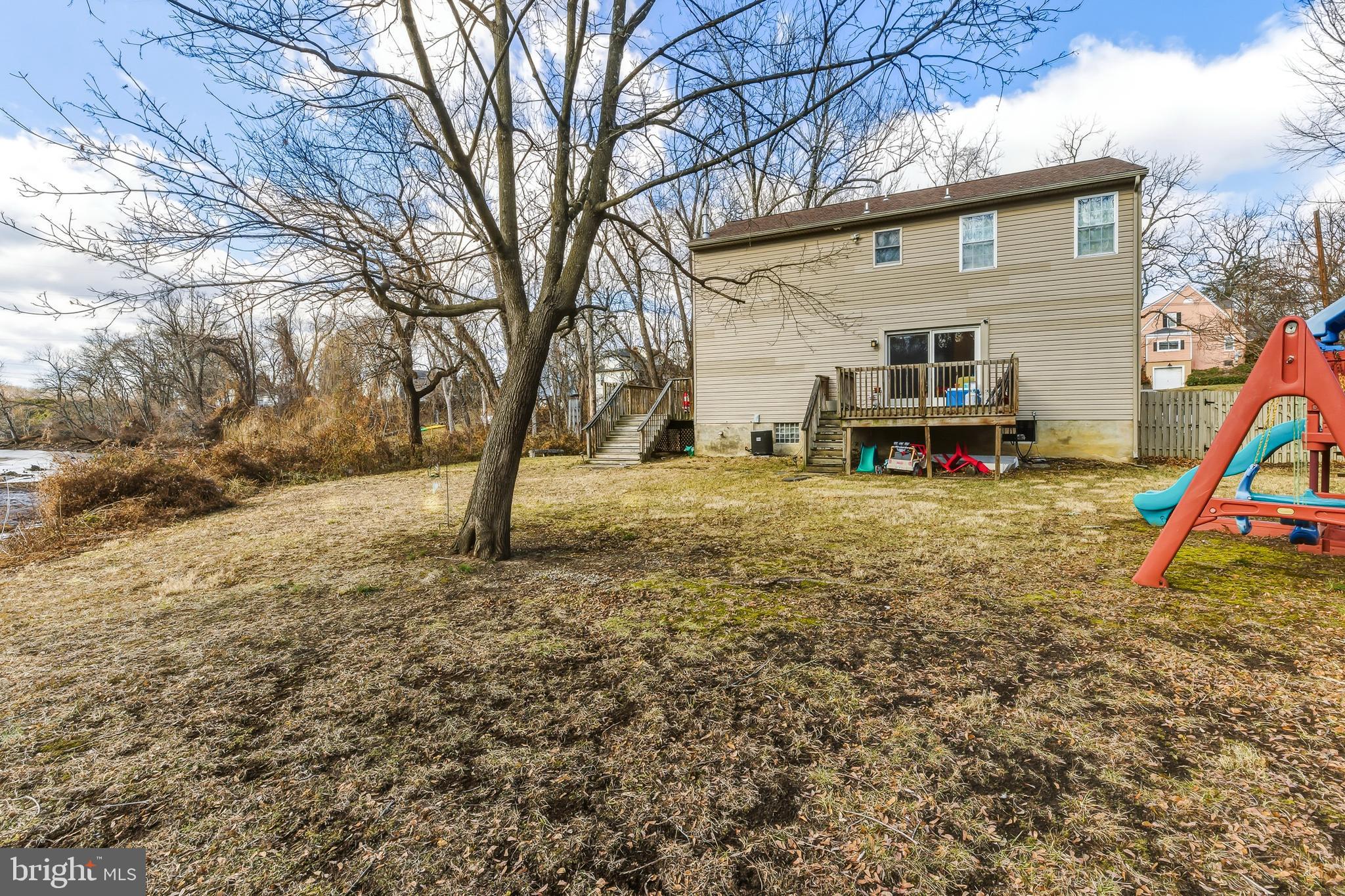 18 Front Street Glendora, NJ 08029 - Photo 4 of 21 a view of a house with a yard