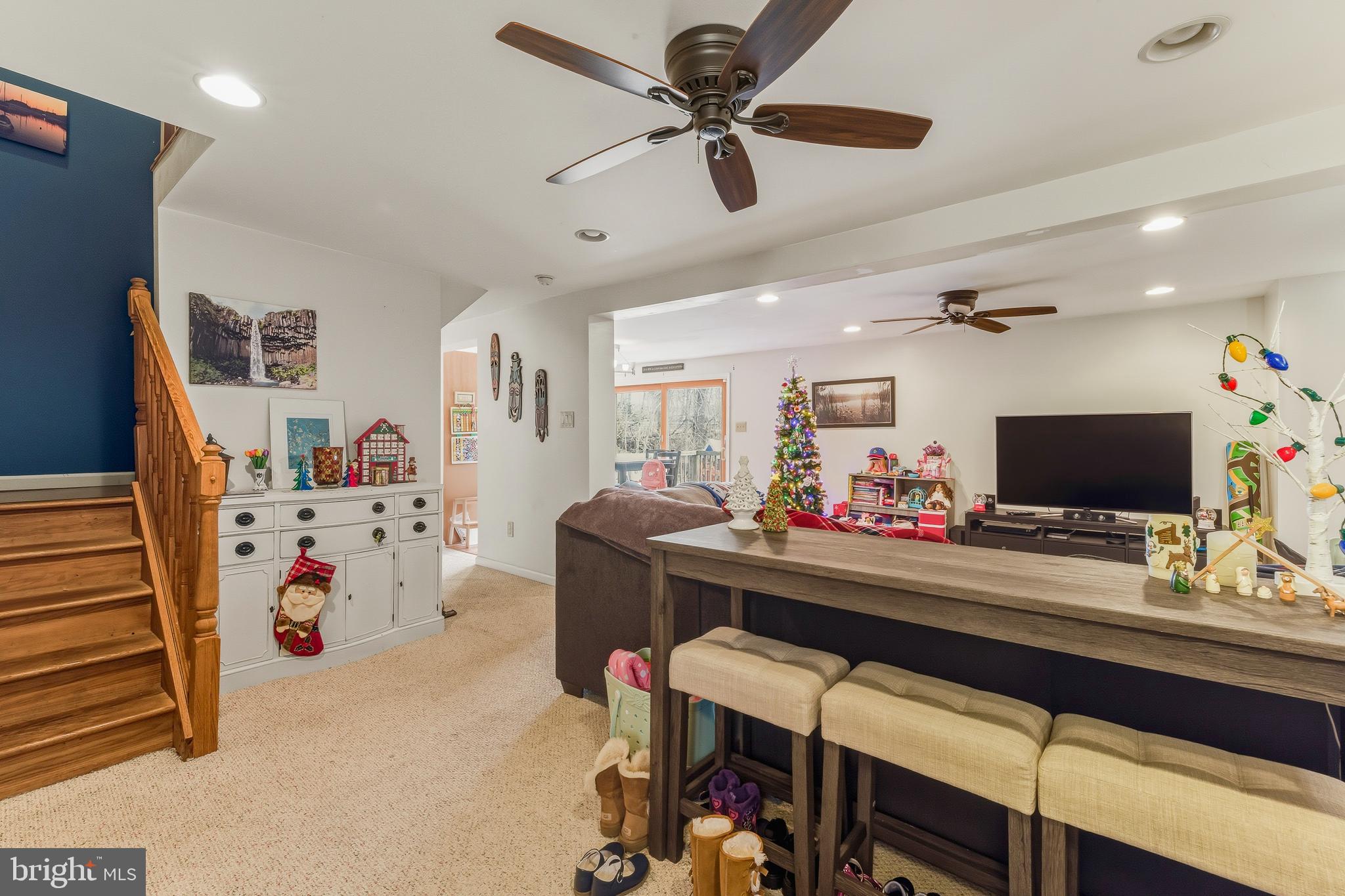 18 Front Street Glendora, NJ 08029 - Photo 6 of 21 a room with furniture and a flat screen tv
