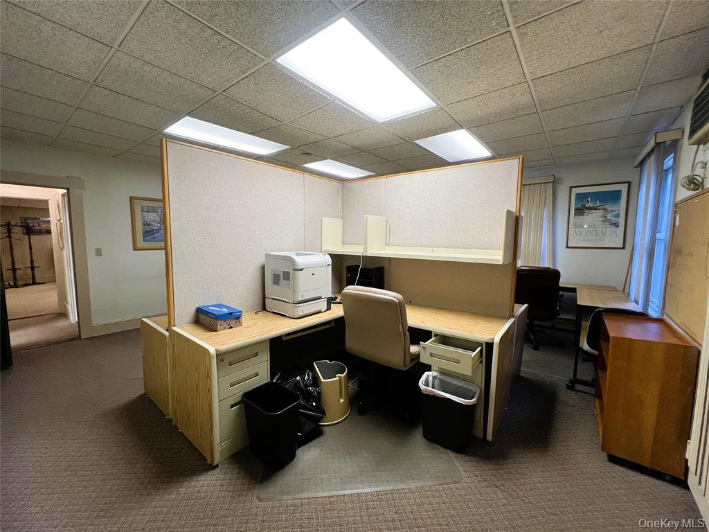 2566 Middle Country Road Centereach, NY 11720 - Photo 16 of 31 a work place with table and chairs