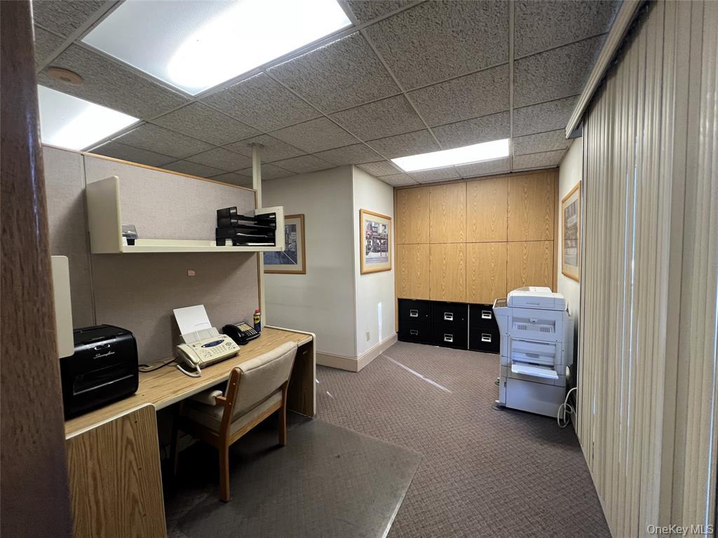 2566 Middle Country Road Centereach, NY 11720 - Photo 18 of 31 a view of workspace with furniture and window